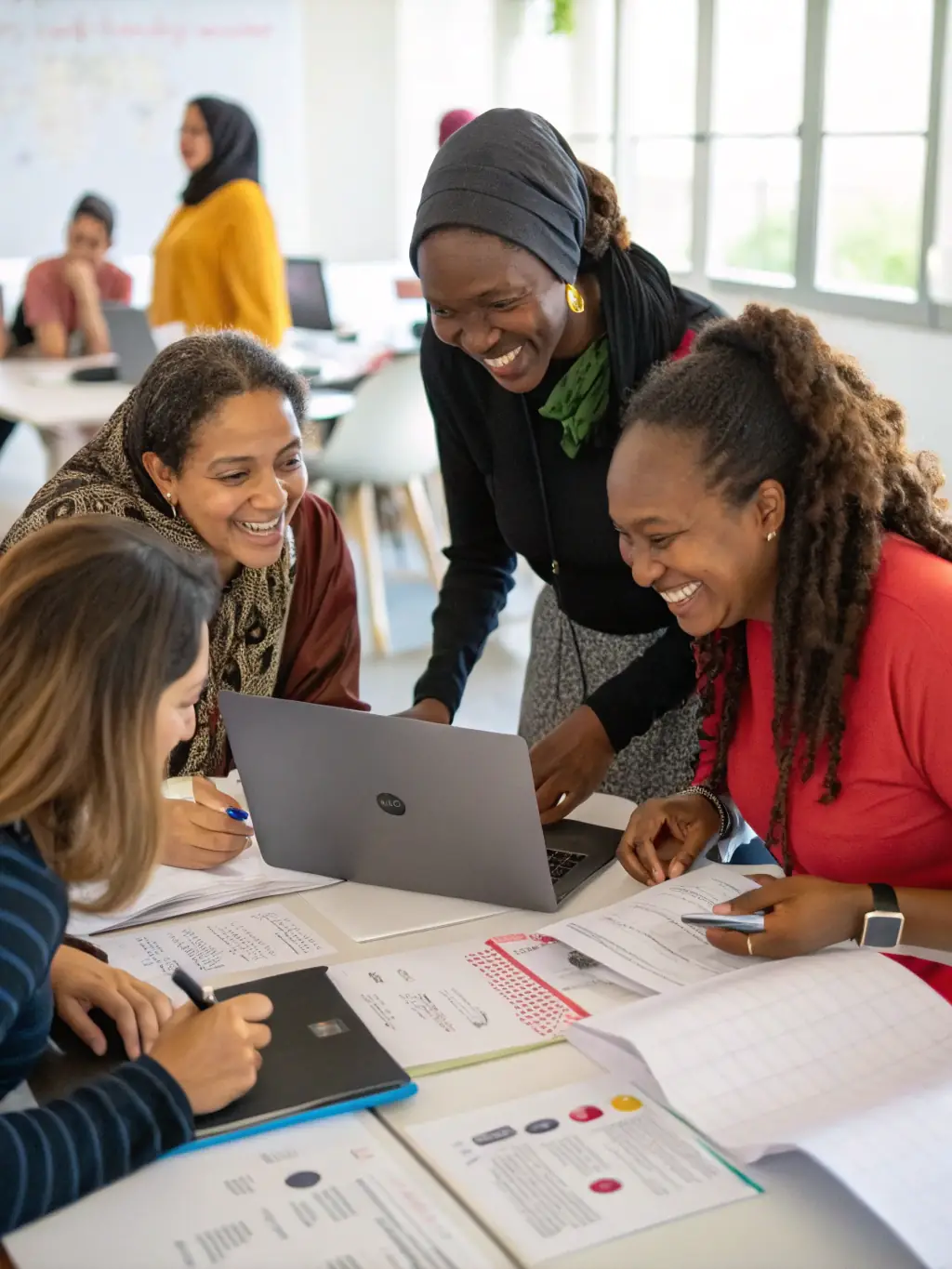 Women participating in a GHDF-sponsored workshop, learning new skills and gaining economic independence, highlighting the foundation's women empowerment efforts.
